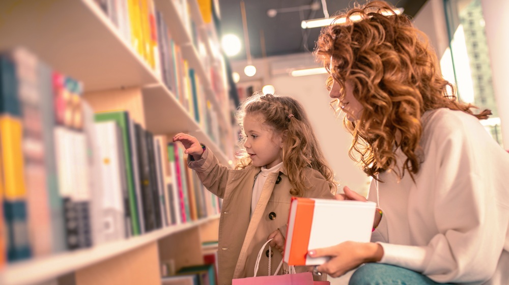 Mother and daughter using the library.
