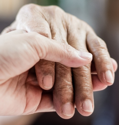 hands together providing comfort