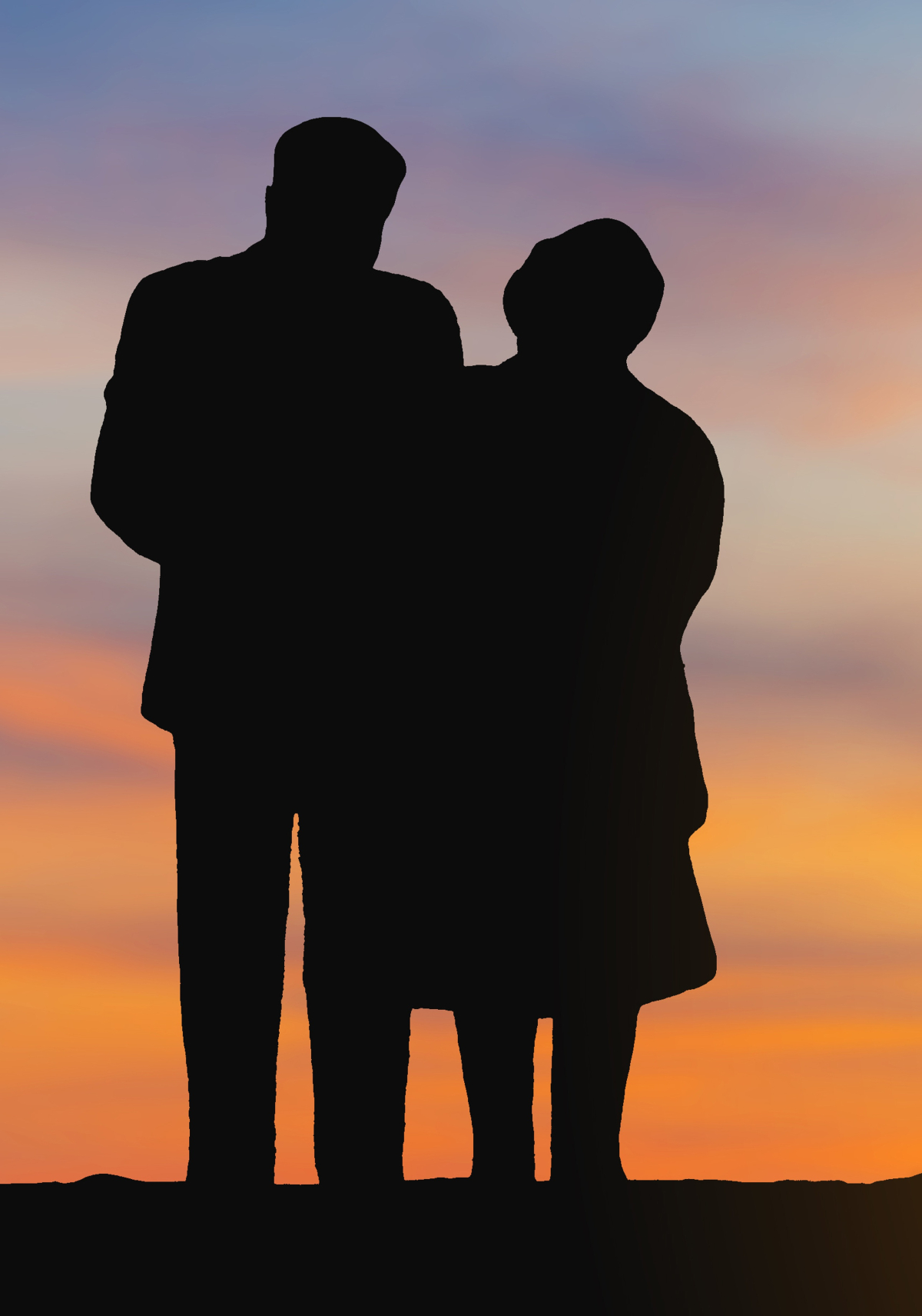 Silhouettes of an elderly couple watching a sunset.